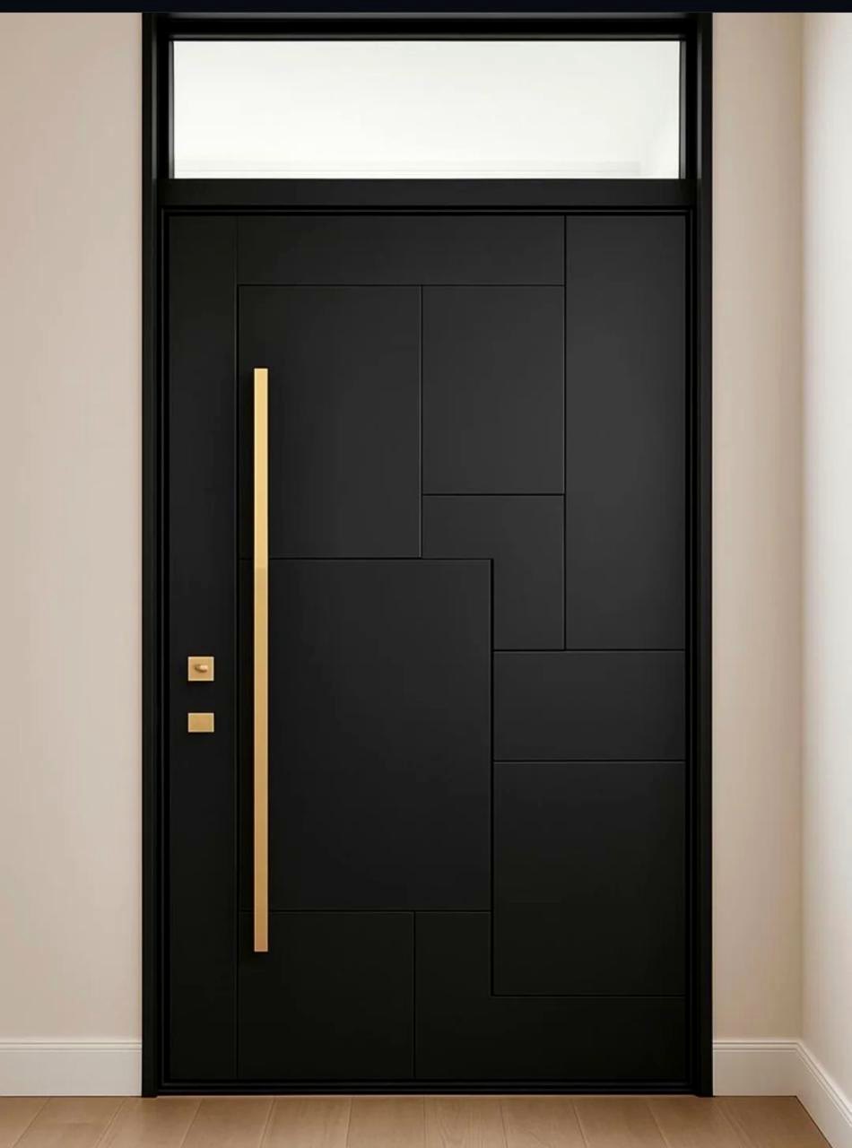 Black entrance door with geometric panel detail and gold handle