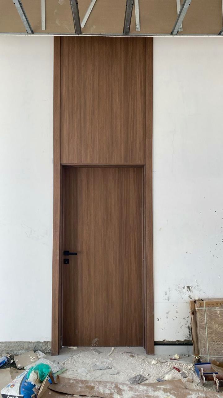 Full height timber finish interior door